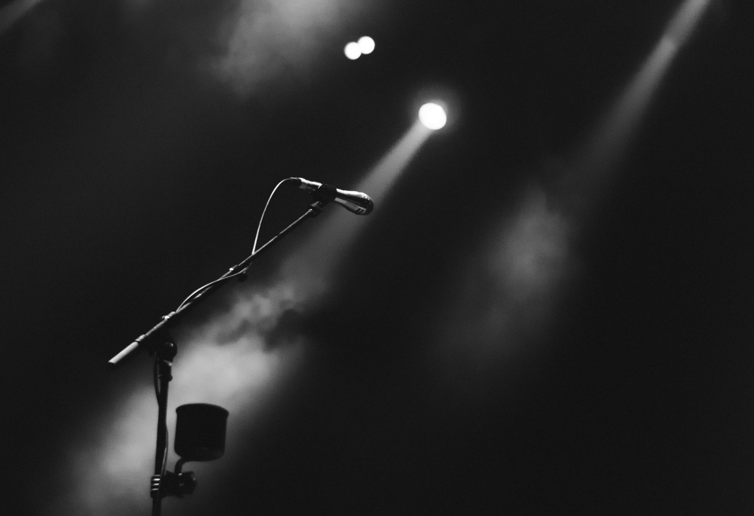 image of a microphone in the dark